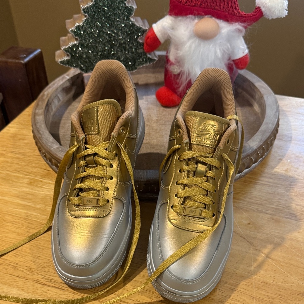 Nike women’s  Metallic Gold Sneakers